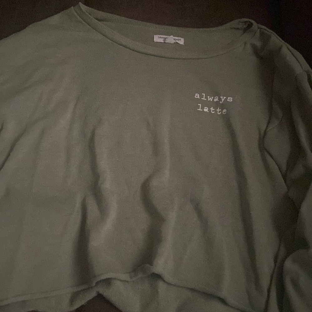 A green shirt that’s a small